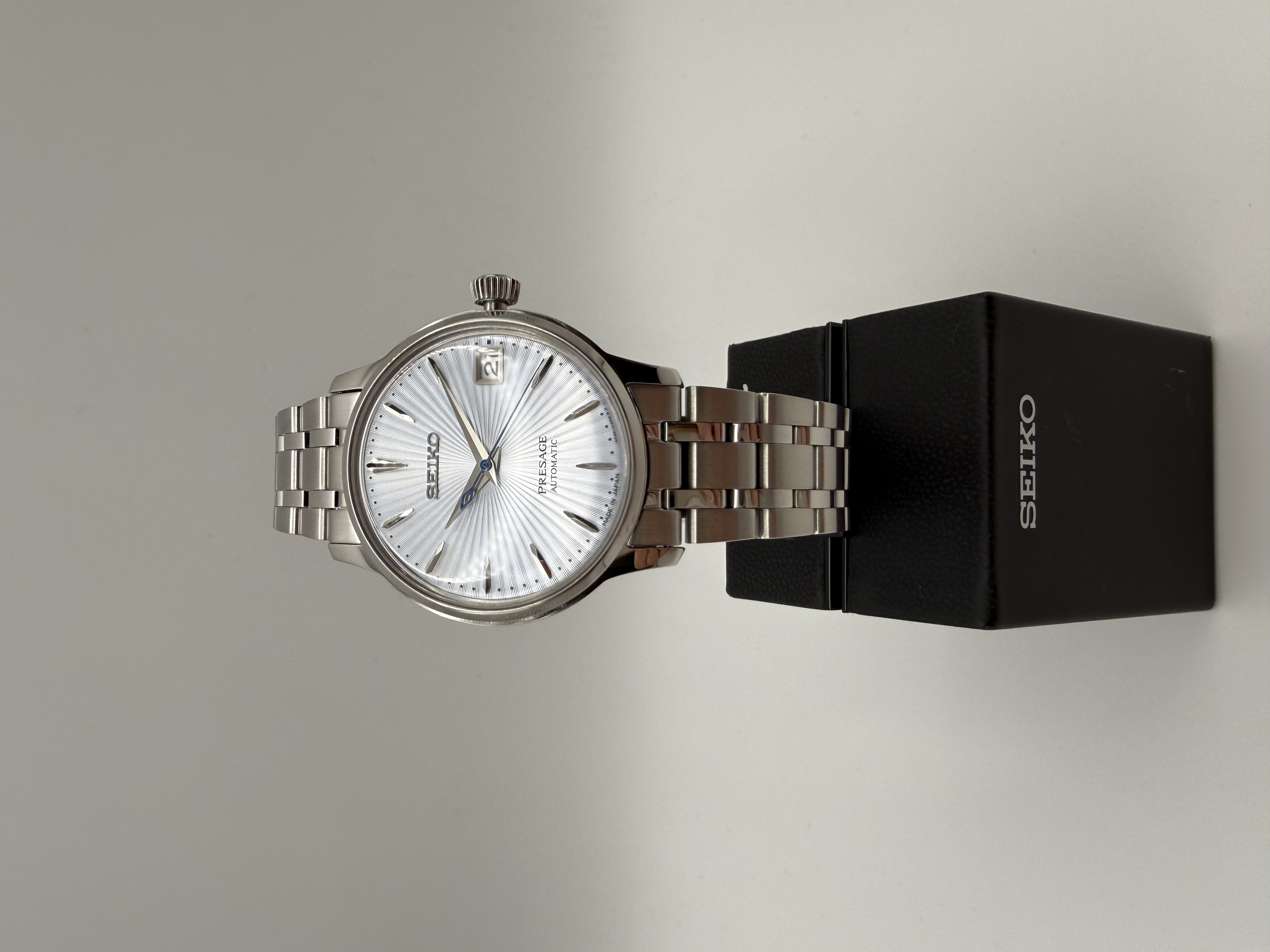Seiko Herrenuhr Presage Automatic weißes Sonnenschliff Zifferblatt Stahlarmband