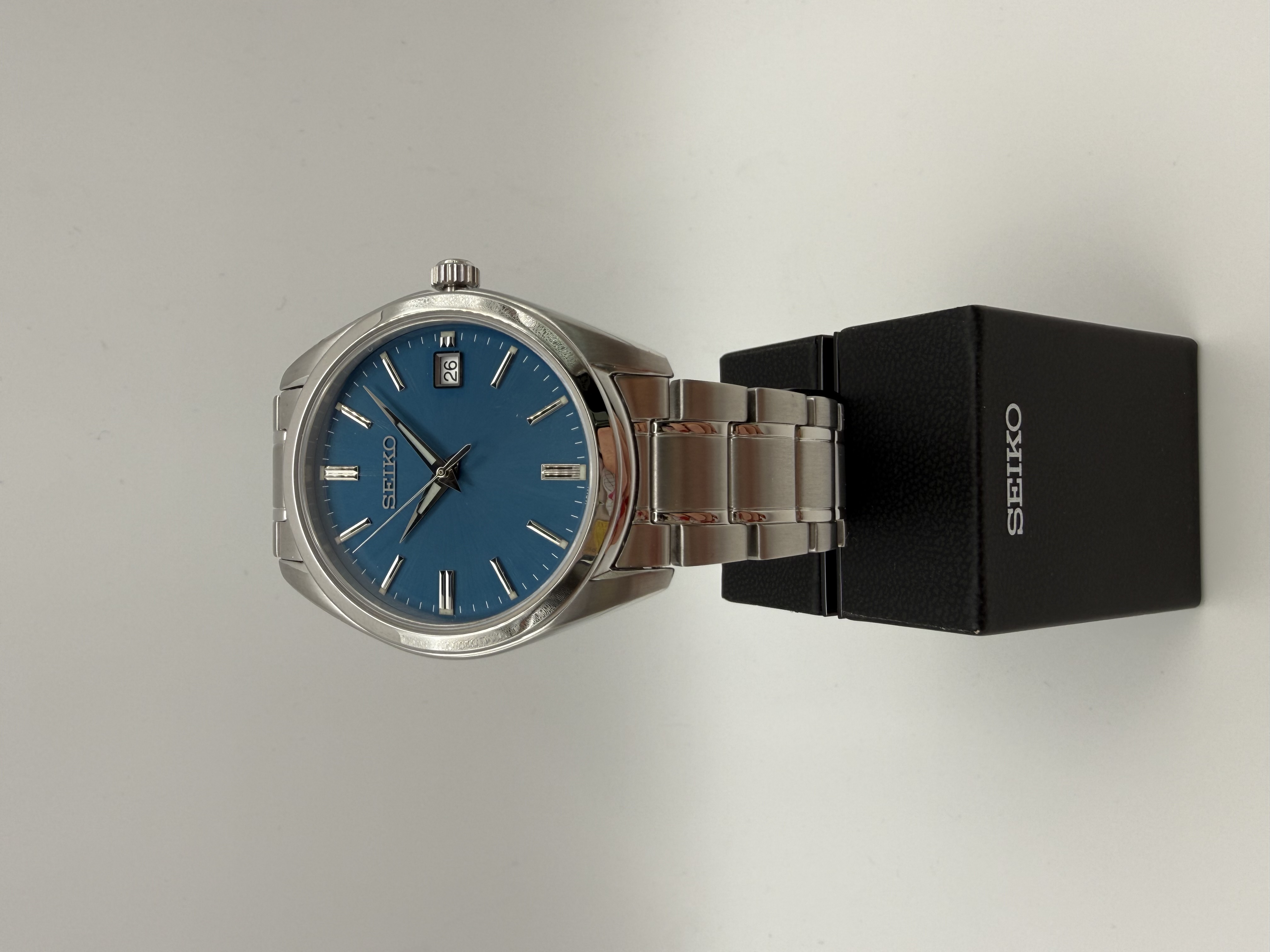 Seiko Herrenuhr blaues Zifferblatt Datumsanzeige Stahlarmband